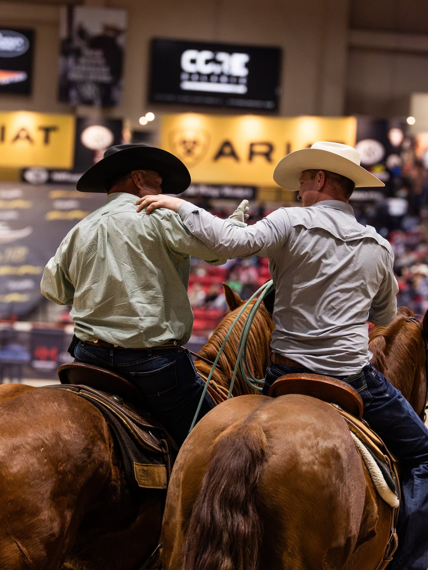 Two ropers riding out together at a WSTR event