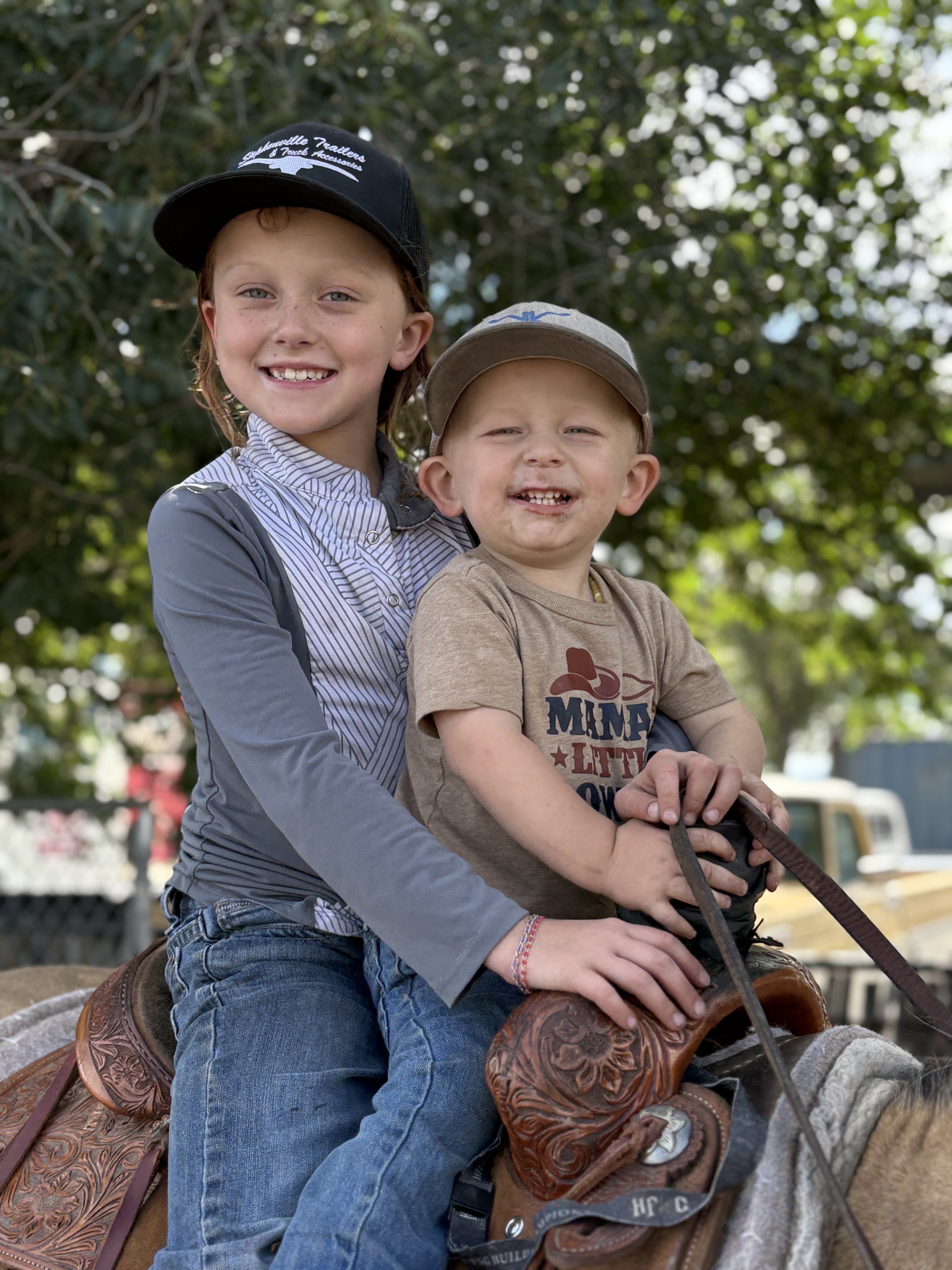 Kids on horseback at Mathews Land & Cattle